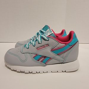 Reebok 619 classic Kids Shoe.